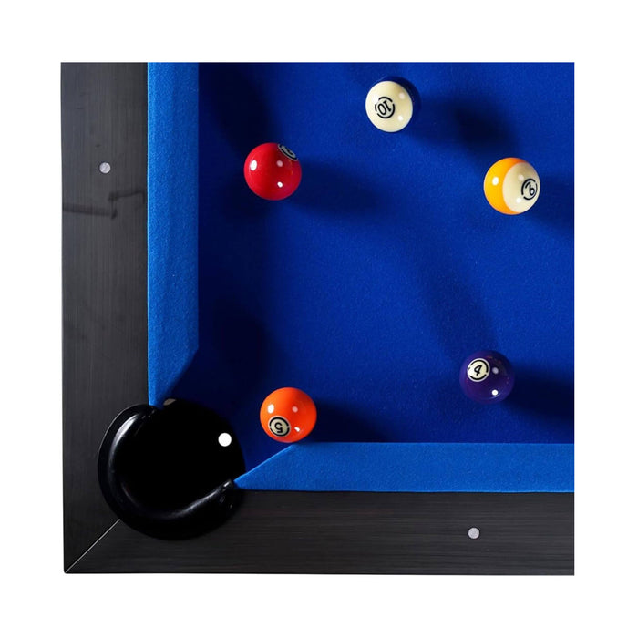 Pool table with balls on a blue felt surface