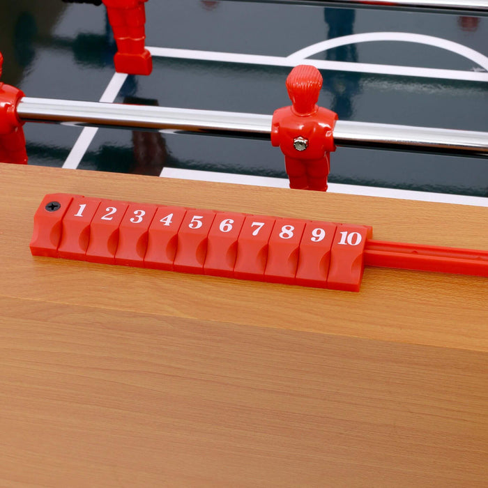 Red scoring device on a table football table with numbers 1 to 10.