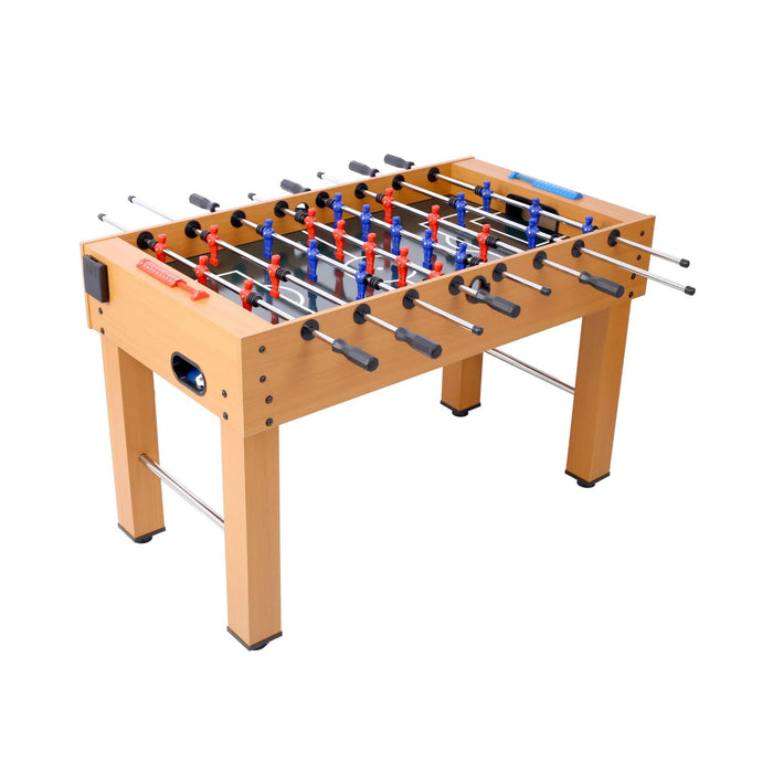 Foosball table with wooden surface and metal rods on a white background