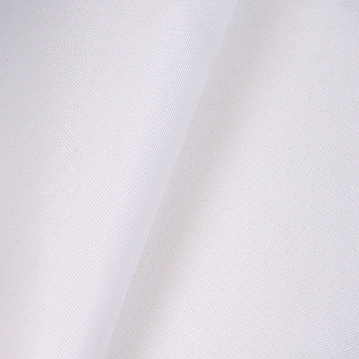 Close-up of white fabric with a subtle pattern