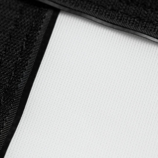 Close-up of a black fabric texture on a white background