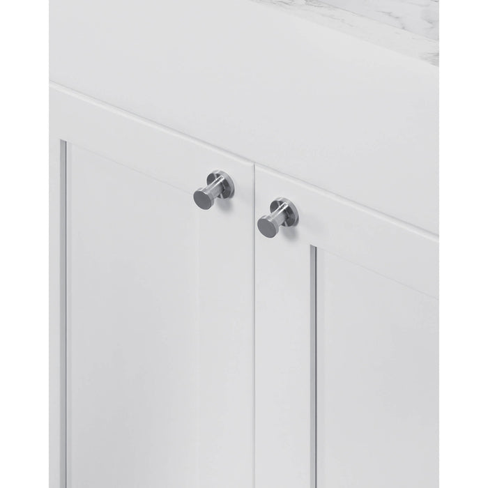 White cabinet with silver knobs on a white background