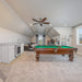 Game room with pool table, kitchenette, and decor