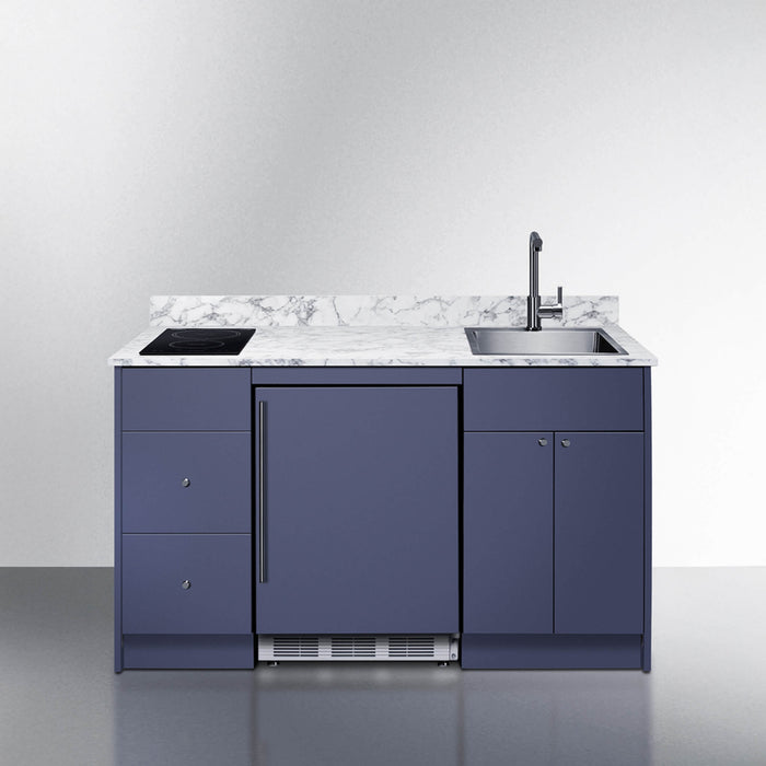 Modern kitchen island with blue cabinets, marble countertop, and black sink.