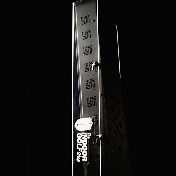 Metallic object with 'The Indoor Golf Shop' branding on a black background